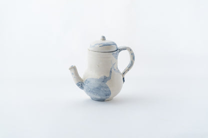 Clumsy-shaped teapot